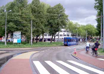 Negotiating a roundabout / traffic circle in Amsterdam.