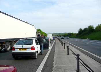 Walking about on a motorway where all traffic has stopped