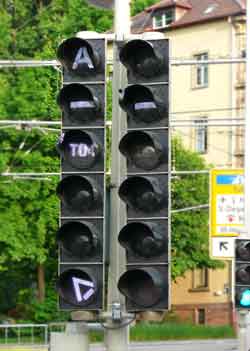 Visually different light rail / tramway / streetcar + other traffic signalling.