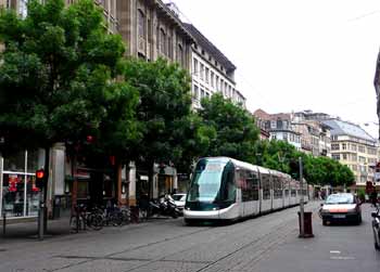Light rail travelling through city street in Strasbourg.
