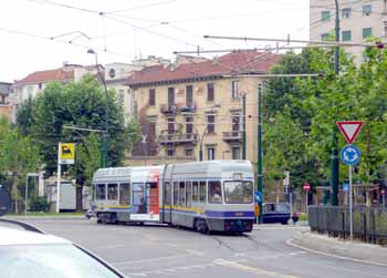 Negotiating a roundabout / traffic circle in Turin.