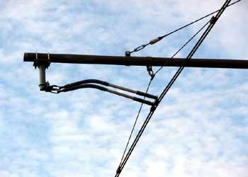 Close up of street based light rail / tram / streetcar overhead wires.