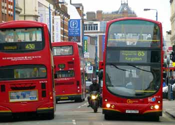 Buses in Putney High Street, London.