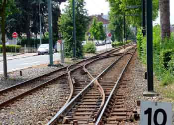Two opposite direction crossover tram train tracks