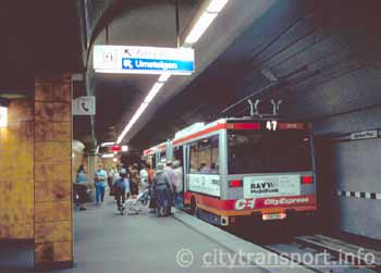 Rear view, see passengers using offside doors.