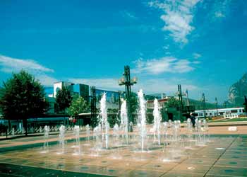 A water feature and Grenoble trams.