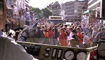 Swiss youngsters in St Gallen delay light tail and trolleybus services by dancing on a very slowly moving van.