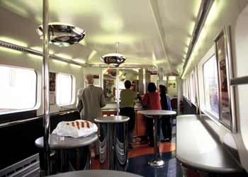 Eurostar buffet carriage - food counter tables seating.